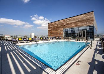 Panoramic rooftop oasis with tanning deck